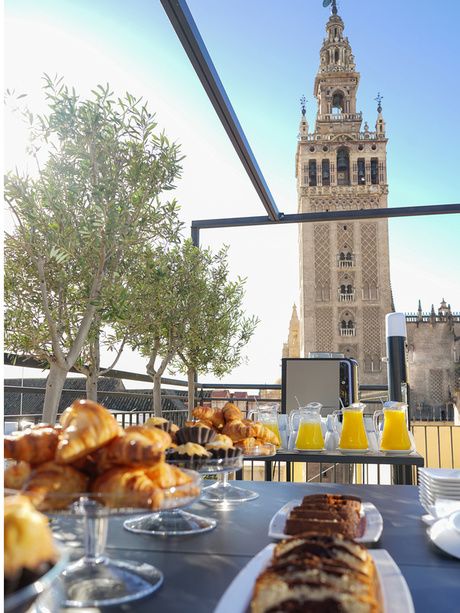 Coffee break at the terrace of the EME Catedral Mercer Hotel