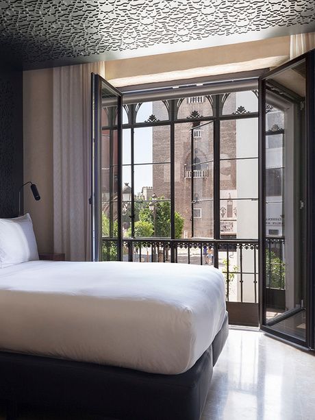 Bedroom of the Grand Deluxe Views at the EME Catedral Mercer