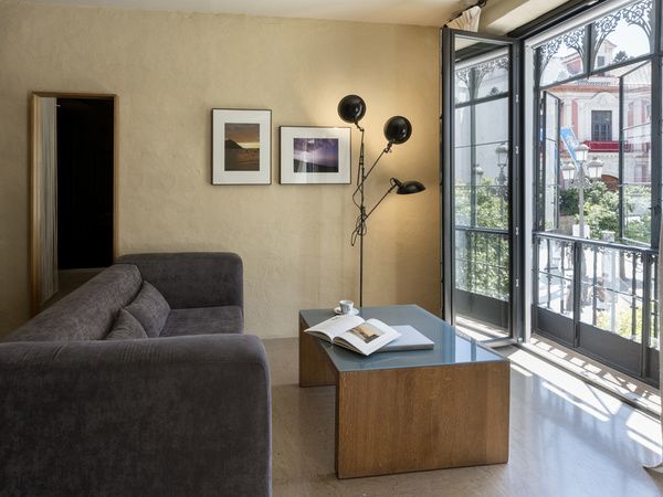 Sofa of the Junior Suite Views at the EME Catedral Mercer