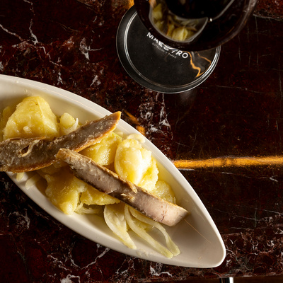 Dressed potateos with tuna belly tapa at Maestro in the Hotel EME Catedral Mercer