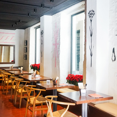 Tables of the Mi Arma Restaurant from EME Catedral Mercer Hotel