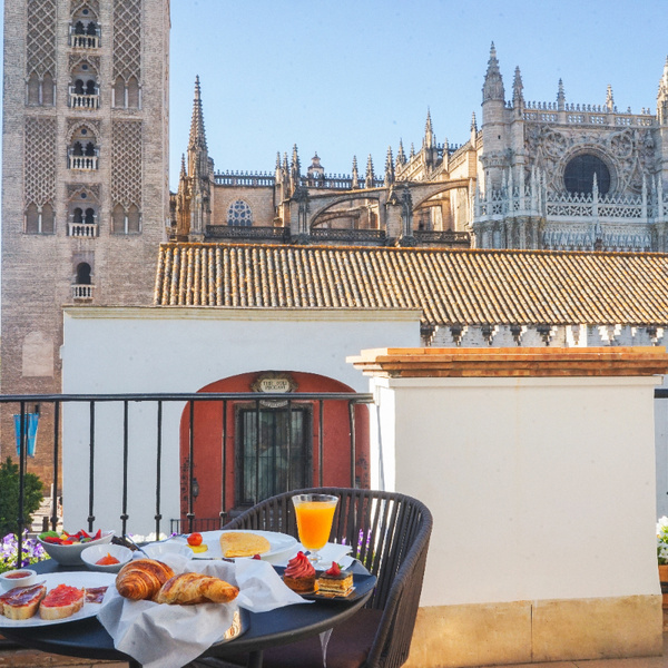 Breakfast on the terrace of the room of the EME Catedral Mercer Hotel